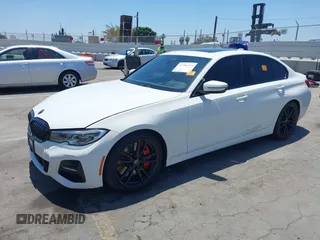 2019 BMW 3 Series 330i with VIN WBA5R1C55KAJ98934, listed as a IAAI auction lot 42396379 with 65,946 mi miles and . Bid and sale history available at DreamBid. Image 19.