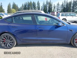 2023 Tesla Model 3 Performance with VIN 5YJ3E1EC2PF679613, listed as a IAAI auction lot 42099199 with 21,721 mi miles. Bid and sale history available at carsss.com. Image 14.