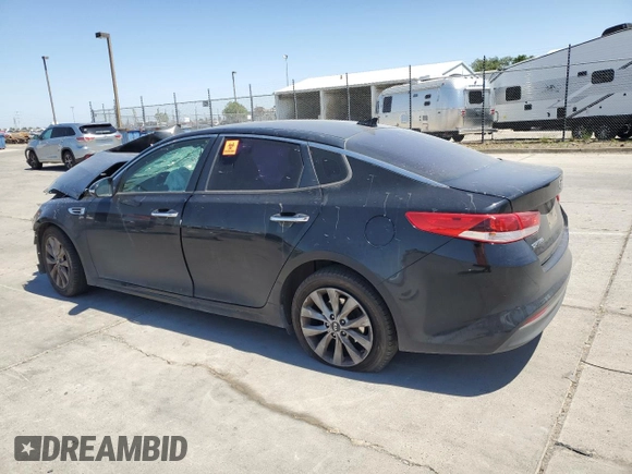 2016 Kia Optima LX z VIN 5XXGT4L33GG070751, wystawiony jako Copart lot #55944535 z przebiegiem 191 694 mil mil oraz Szkoda całkowita • Salvage title. Historia ofert i sprzedaży dostępna na DreamBid. Obrazek 2.