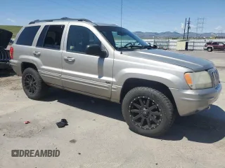 2001 Jeep Grand Cherokee Limited with VIN 1J4GW58N11C568908, listed as a Copart auction lot 55697175 with 214,491 mi miles and Clean Title. Bid and sale history available at DreamBid. Image 4.