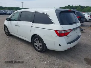 2012 Honda Odyssey EX-L with VIN 5FNRL5H62CB059481, listed as a IAAI auction lot 42241415 with 135,244 mi miles and . Bid and sale history available at DreamBid. Image 3.