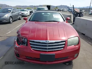 2005 Chrysler Crossfire Limited z VIN 1C3AN65L65X057205, wystawiony jako IAAI lot #41878855 z przebiegiem 209 199 mil mil oraz . Historia ofert i sprzedaży dostępna na DreamBid. Obrazek 12.