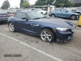 2012 BMW Z4 sDrive35i with VIN WBALM7C56CE384825, listed as a Copart auction lot 53083945 with 87,474 mi miles and Salvage Title. Bid and sale history available at carsss.com. Image 4.