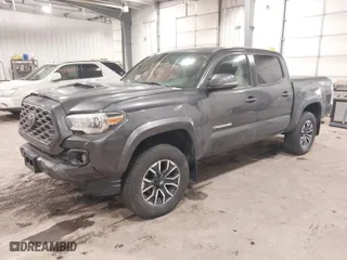 2020 Toyota Tacoma 4WD SR5 with VIN 3TMCZ5AN9LM355230, listed as a IAAI auction lot 41240351 with 122,164 mi miles. Bid and sale history available at carsss.com. Image 2.