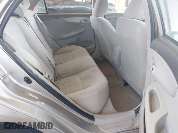 2009 Toyota Corolla with VIN 1NXBU40E79Z049147, listed as a IAAI auction lot 42654211 with 144,504 mi miles and . Bid and sale history available at DreamBid. Image 8.