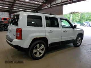 2014 Jeep Patriot Latitude with VIN 1C4NJRFB3ED766143, listed as a Copart auction lot 57879215 with 145,733 mi miles and Clean title. Bid and sale history available at DreamBid. Image 3.