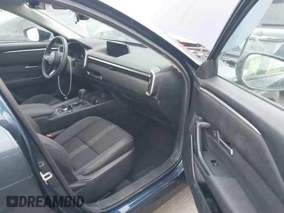 2024 Mazda CX-50 S Select with VIN 7MMVABAM8RN220180, listed as a IAAI auction lot 40608590 with 3,203 mi miles and . Bid and sale history available at DreamBid. Image 5.