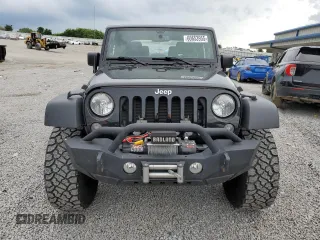 2014 Jeep Wrangler Sport with VIN 1C4AJWAG5EL326480, listed as a Copart auction lot 60653955 with 94,102 mi miles and Salvage title. Bid and sale history available at DreamBid. Image 5.