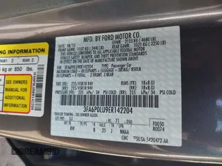 2014 Ford Fusion SE Hybrid with VIN 3FA6P0LU9ER142204, listed as a IAAI auction lot 41964308 with 177,499 mi miles. Bid and sale history available at carsss.com. Image 9.