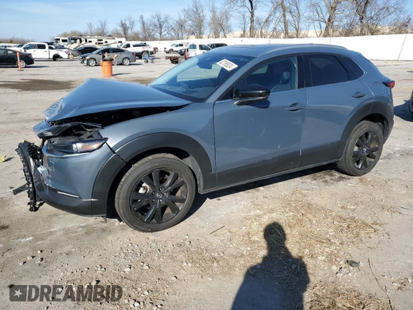 2021 Mazda CX-30 Premium with VIN 3MVDMBDY6MM300242, listed as a Copart auction lot 82195024 with 34,500 mi miles and Salvage Title. Bid and sale history available at carsss.com. Image 1.