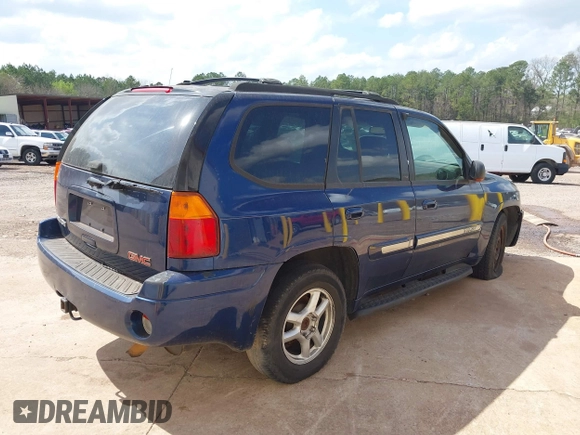 2002 GMC Envoy SLT with VIN 1GKDT13S322515582, listed as a IAAI auction lot 41528624 with 258,904 mi miles. Bid and sale history available at carsss.com. Image 4.