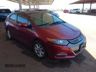 2010 Honda Insight EX z VIN JHMZE2H75AS039340, wystawiony jako IAAI lot #42424092 z przebiegiem 166 525 mil mil oraz . Historia ofert i sprzedaży dostępna na DreamBid. Obrazek 1.