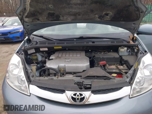 2008 Toyota Sienna XLE with VIN 5TDZK22C18S102498, listed as a IAAI auction lot 41623508 with 214,485 mi miles. Bid and sale history available at carsss.com. Image 10.