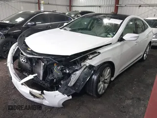 2014 Hyundai Azera Limited with VIN KMHFH4JG7EA378755, listed as a IAAI auction lot 42027136 with 216,082 mi miles and . Bid and sale history available at carsss.com. Image 2.