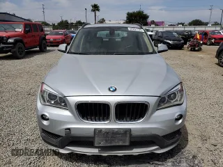 2015 BMW X1 sDrive28i z VIN WBAVM1C55FV317854, wystawiony jako Copart lot #52201705 z przebiegiem 86 015 mil mil oraz Szkoda całkowita • Salvage title. Historia ofert i sprzedaży dostępna na DreamBid. Obrazek 5.