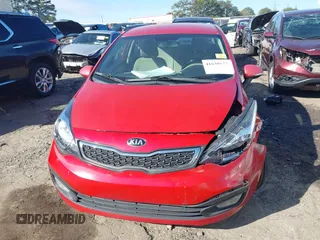 2014 Kia Rio EX z VIN KNADN4A35E6355797, wystawiony jako IAAI lot #41639623 z przebiegiem 152 057 mil mil oraz . Historia ofert i sprzedaży dostępna na DreamBid. Obrazek 12.