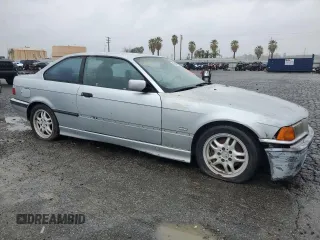 1998 BMW 3 Series 328is with VIN WBABG132XWET07045, listed as a Copart auction lot 49470225 with 186,922 mi miles and Clean Title. Bid and sale history available at carsss.com. Image 4.