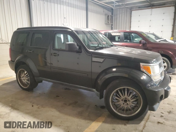 2008 Dodge Nitro SXT z VIN 1D8GT28K28W246131, wystawiony jako Copart lot #60037665 z przebiegiem 119 831 mil mil oraz Szkoda całkowita • Salvage title. Historia ofert i sprzedaży dostępna na DreamBid. Obrazek 4.