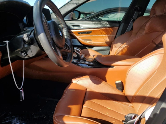 2023 BMW M5 with VIN WBS83CH02PCM33496, listed as a Copart auction lot 85286394 with 0 mi miles and Salvage Title. Bid and sale history available at carsss.com. Image 7.