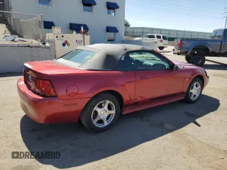 2003 Ford Mustang Deluxe с VIN 1FAFP44463F438457, выставлен на аукционе Copart как лот 57599045 с пробегом 41 349 миль миль и Списание • Salvage title. История ставок и продаж доступна на DreamBid. Изображение 3.