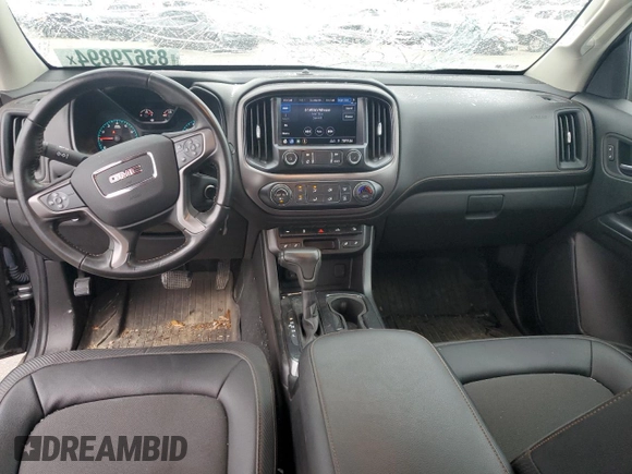 2021 GMC Canyon 4WD AT4 w/Leather with VIN 1GTG6FEN4M1116175, listed as a Copart auction lot 83679894 with 33,646 mi miles and Salvage Title. Bid and sale history available at carsss.com. Image 8.