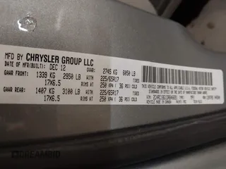 2013 Chrysler Town & Country Touring with VIN 2C4RC1BG1DR646691, listed as a IAAI auction lot 42051933 with 162,960 mi miles. Bid and sale history available at carsss.com. Image 9.