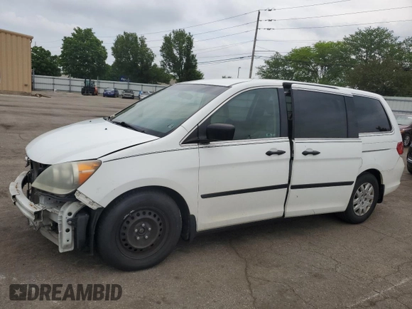 2009 Honda Odyssey LX z VIN 5FNRL38259B050624, wystawiony jako Copart lot #57357605 z przebiegiem 232 991 mil mil oraz Czysty tytuł • Clean title. Historia ofert i sprzedaży dostępna na DreamBid. Obrazek 1.