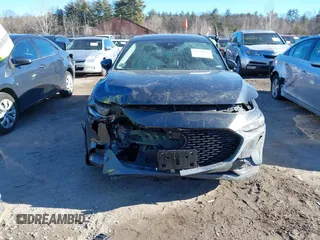 2022 Mazda 3 Carbon Edition z VIN 3MZBPACL4NM309701, wystawiony jako IAAI lot #41419875 z przebiegiem 23 819 mil mil oraz . Historia ofert i sprzedaży dostępna na DreamBid. Obrazek 6.