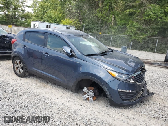 2012 Kia Sportage LX z VIN KNDPBCA27C7234285, wystawiony jako Copart lot #65807995 z przebiegiem 178 515 mil mil oraz Czysty tytuł • Clean title. Historia ofert i sprzedaży dostępna na DreamBid. Obrazek 4.