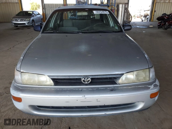 1994 Toyota Corolla with VIN 1NXAE04B3RZ141955, listed as a Copart auction lot 50254875 with 331,593 mi miles and Salvage title. Bid and sale history available at DreamBid. Image 5.