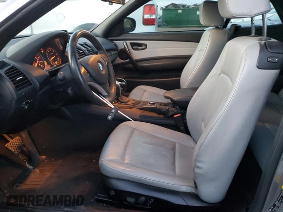 2012 BMW 1 Series 128i with VIN WBAUN1C5XCVH84145, listed as a Copart auction lot 82579054 with 40,309 mi miles and Salvage title. Bid and sale history available at DreamBid. Image 7.