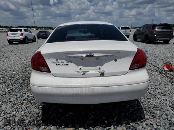 2003 Ford Taurus SES Standard z VIN 1FAFP55U93A162213, wystawiony jako Copart lot #54657645 z przebiegiem 43 756 mil mil oraz Szkoda całkowita • Salvage title. Historia ofert i sprzedaży dostępna na DreamBid. Obrazek 6.