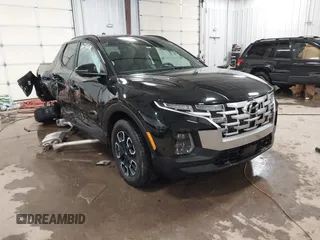 2023 Hyundai Santa Cruz SEL Premium z VIN 5NTJDDAF9PH042362, wystawiony jako IAAI lot #41357072 z przebiegiem 17 258 mil mil oraz . Historia ofert i sprzedaży dostępna na DreamBid. Obrazek 1.