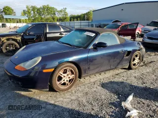 2000 Porsche Boxster z VIN WP0CA2989YU627749, wystawiony jako Copart lot #54054305 z przebiegiem 189 173 mil mil oraz Szkoda całkowita • Salvage title. Historia ofert i sprzedaży dostępna na DreamBid. Obrazek 1.