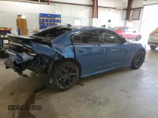 2021 Dodge Charger GT with VIN 2C3CDXHG0MH633356, listed as a Copart auction lot 53701615 with 56,638 mi miles and Salvage Title. Bid and sale history available at DreamBid. Image 3.