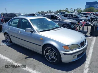 2003 BMW 3 Series 330i with VIN WBAEV53443KM31045, listed as a IAAI auction lot 42711044 with Not provided miles and . Bid and sale history available at DreamBid. Image 1.