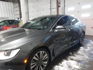 2017 Lincoln MKZ Hybrid Reserve z VIN 3LN6L5MU9HR637908, wystawiony jako IAAI lot #38541395 z przebiegiem 272 691 mil mil oraz . Historia ofert i sprzedaży dostępna na DreamBid. Obrazek 6.