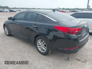 2013 Kia Optima LX with VIN 5XXGM4A70DG249828, listed as a IAAI auction lot 42074167 with 143,986 mi miles. Bid and sale history available at carsss.com. Image 3.