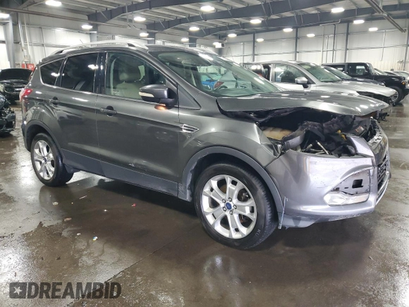2015 Ford Escape Titanium with VIN 1FMCU9J90FUA26808, listed as a Copart auction lot 54449805 with 184,576 mi miles and Salvage title. Bid and sale history available at DreamBid. Image 4.