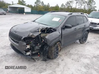 2022 Jeep Cherokee X with VIN 1C4PJMCX0ND538919, listed as a IAAI auction lot 41321416 with 65,577 mi miles. Bid and sale history available at carsss.com. Image 17.