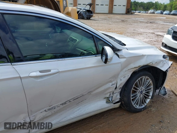 2015 Ford Fusion SE with VIN 3FA6P0HD9FR123677, listed as a IAAI auction lot 42021493 with 166,446 mi miles and . Bid and sale history available at DreamBid. Image 6.