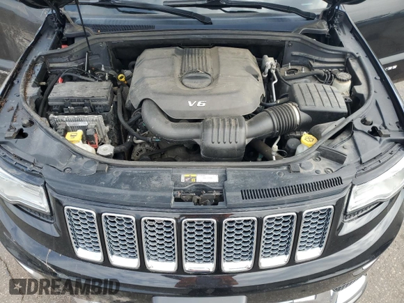 2015 Jeep Grand Cherokee Summit with VIN 1C4RJFJG2FC913658, listed as a Copart auction lot 52160035 with 138,008 mi miles and Salvage Title. Bid and sale history available at DreamBid. Image 13.