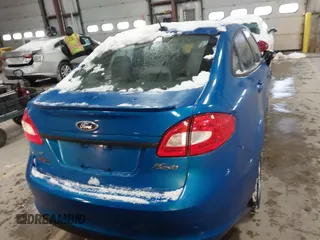 2013 Ford Fiesta SE z VIN 3FADP4BJ7DM225471, wystawiony jako IAAI lot #41625556 z przebiegiem 70 948 mil mil oraz . Historia ofert i sprzedaży dostępna na DreamBid. Obrazek 16.