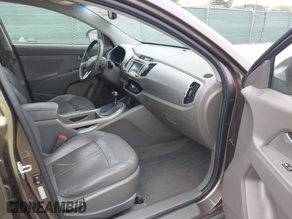 2011 Kia Sportage EX with VIN KNDPC3A23B7029574, listed as a IAAI auction lot 42168504 with 208,407 mi miles. Bid and sale history available at carsss.com. Image 5.