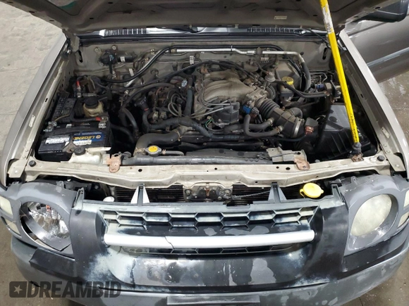 2004 Nissan Xterra XE with VIN 5N1ED28YX4C650888, listed as a Copart auction lot 57151695 with 142,210 mi miles and Salvage title. Bid and sale history available at DreamBid. Image 12.