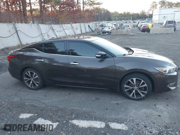 2016 Nissan Maxima Platinum with VIN 1N4AA6AP9GC405420, listed as a IAAI auction lot 41121830 with 59,680 mi miles and . Bid and sale history available at DreamBid. Image 13.