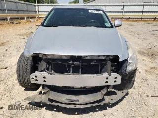 2014 Cadillac ATS Standard RWD z VIN 1G6AA5RX1E0167721, wystawiony jako Copart lot #53982705 z przebiegiem 160 328 mil mil oraz Szkoda całkowita • Salvage title. Historia ofert i sprzedaży dostępna na DreamBid. Obrazek 5.