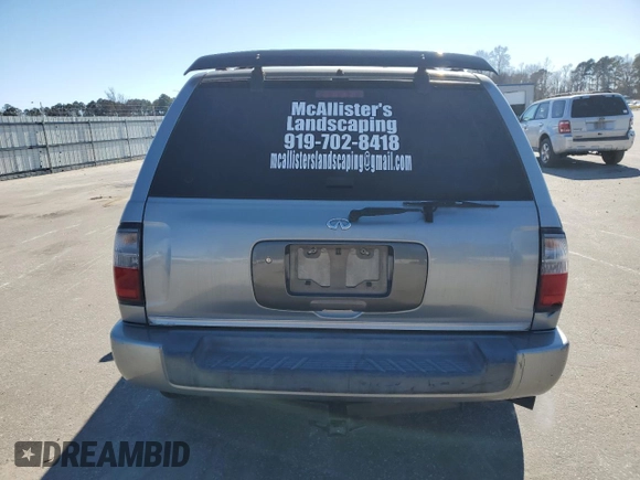 2000 Infiniti QX4 with VIN JNRAR07Y1YW077992, listed as a Copart auction lot 45572015 with 202,385 mi miles and Salvage Title. Bid and sale history available at DreamBid. Image 6.
