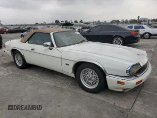 1994 Jaguar XJS with VIN SAJNX2749RC191243, listed as a Copart auction lot 76037994 with 74,842 mi miles and Salvage Title. Bid and sale history available at carsss.com. Image 4.