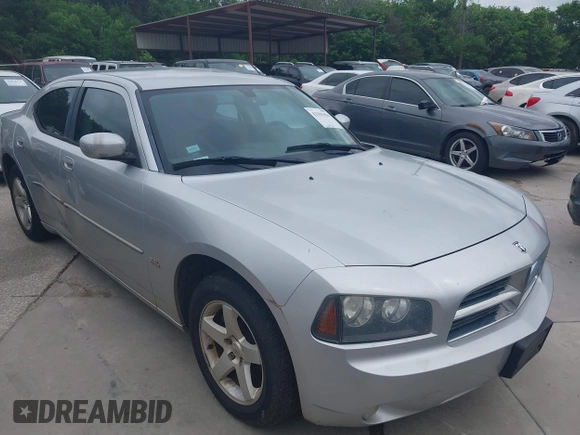 2010 Dodge Charger SXT with VIN 2B3CA3CV2AH227658, listed as a IAAI auction lot 42101656 with 162,392 mi miles. Bid and sale history available at carsss.com. Image 1.